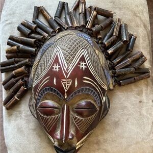 Handcrafted Tribal Mask with Brown and Black Accents